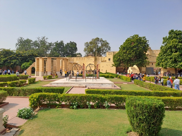 Visitors exploring a historical astronomical site.