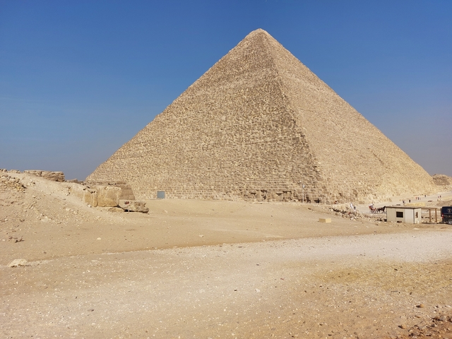 The Great Pyramid of Giza standing prominently on a sunny day.