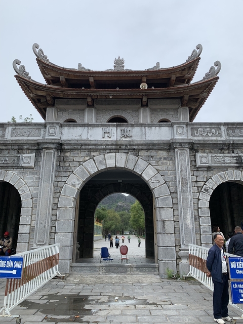 Stone gate with carved letters.