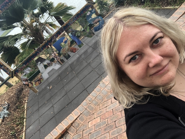       Selfie with a colorful mosaic sculpture
  