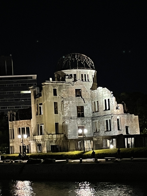 Atomic Bomb Dome illuminated at night.