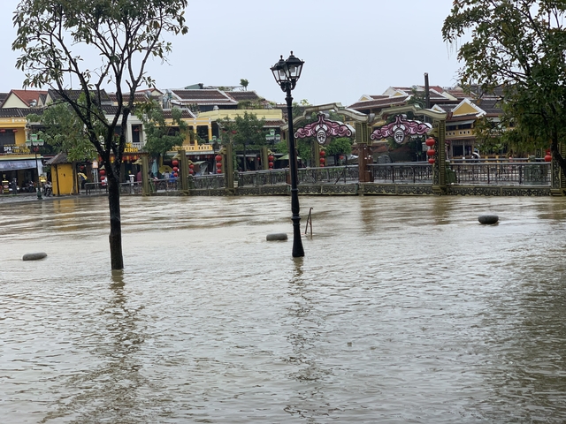 Flooded streets in historical town with colorful buildings
