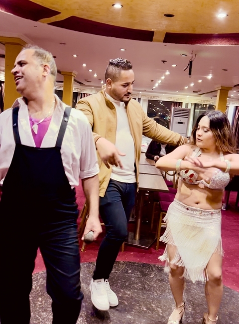 People dancing during a cultural performance.