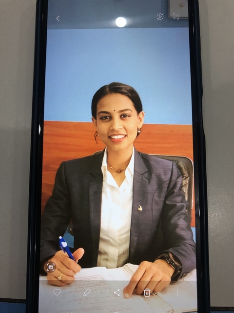 Image of a woman displayed on a digital device.