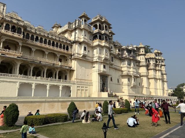       Large palace with intricate architectural details.
  