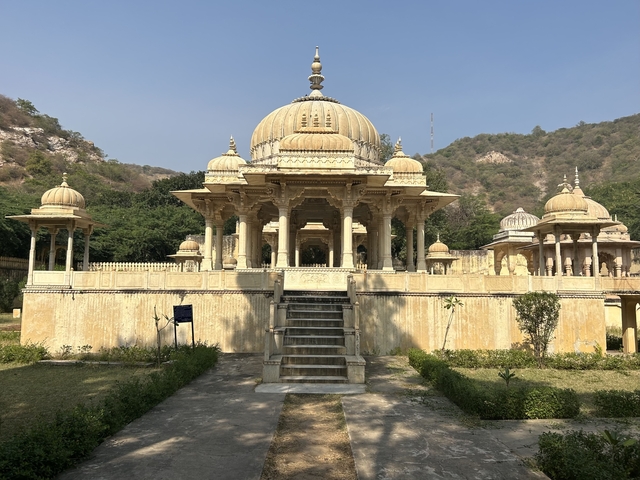       Ornate temple with domed architecture.
  