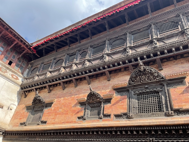       Ornate architectural facade with detailed carvings.
  