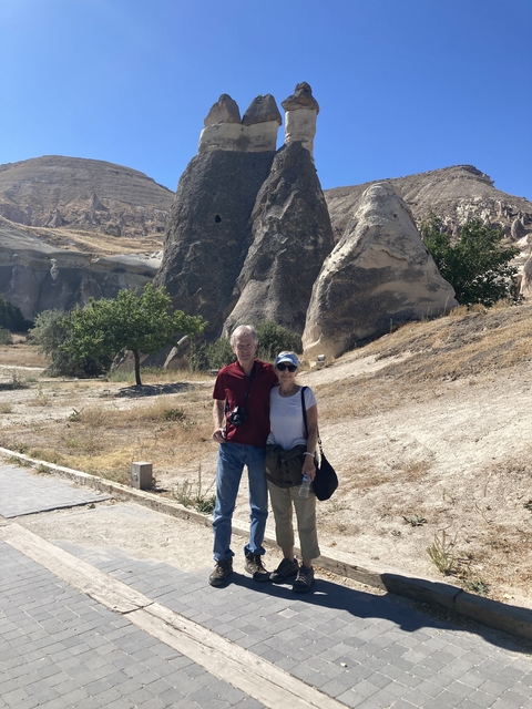 Couple with rock formations in the background.