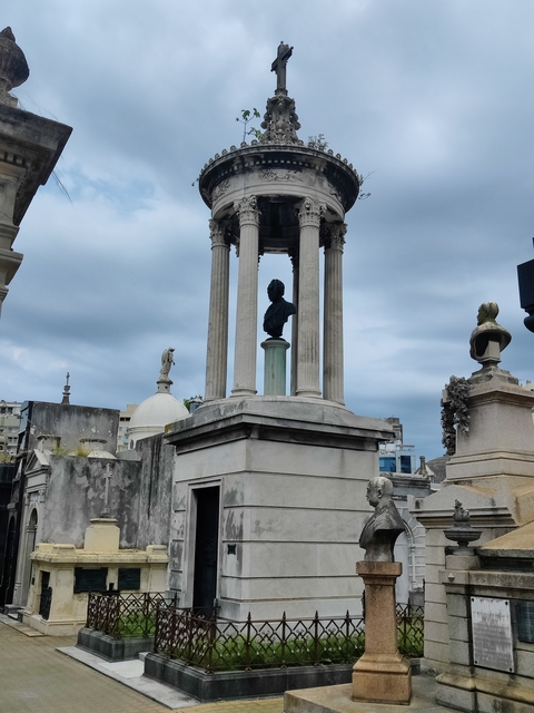 Cemetery with historic monuments and statues.