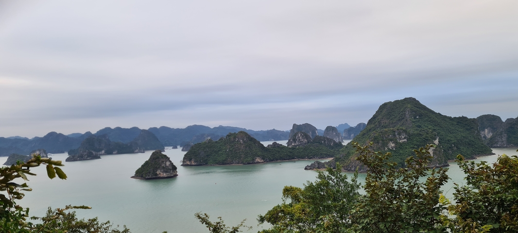 Scenic view of limestone karsts and islands in a bay.