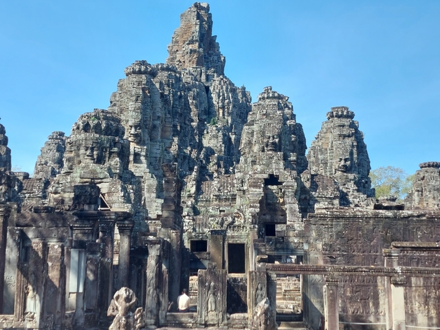 Ruins of an ancient temple with stone carvings.