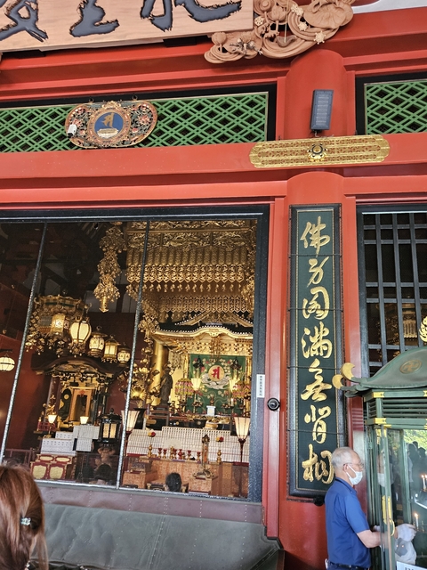 A richly decorated altar inside a temple.