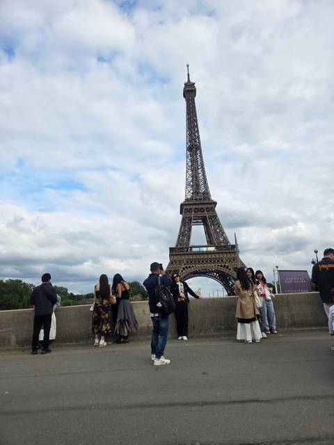 Eiffel Tower with tourists