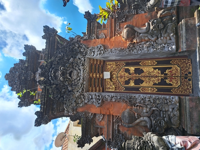 Ornate temple door with intricate carvings.