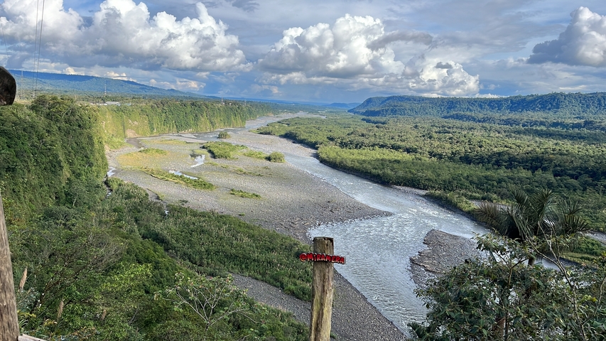 River running through a wide canyon.
