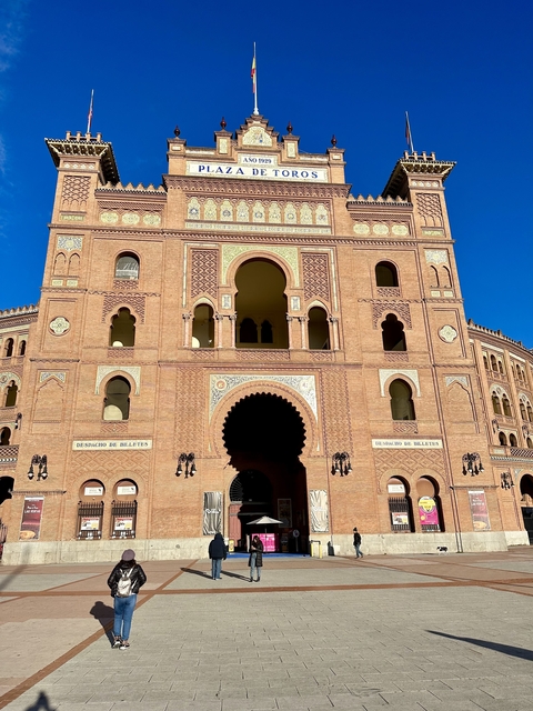 Ornate architectural building with archways and decorations.