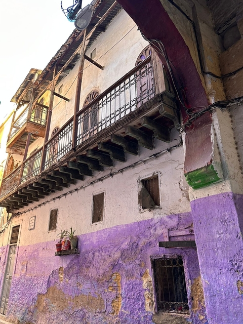 Close-up of traditional Moroccan architecture with balconies.