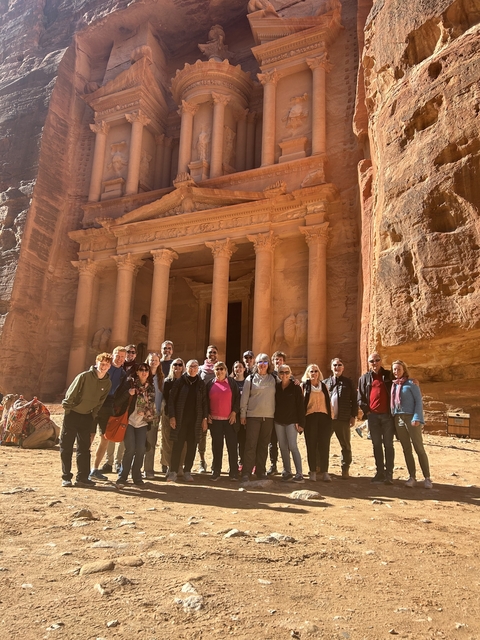 Group photo in front of Petra rock-cut architecture