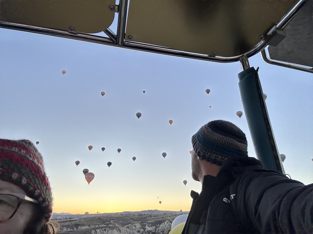 Hot air balloons seen from inside a balloon basket