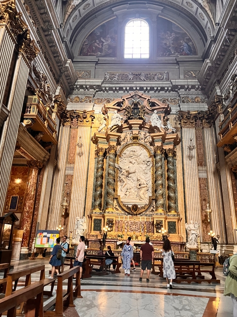 Ornate interior of a historic church with religious art