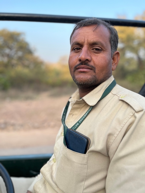 Close-up of a man wearing a ranger outfit.