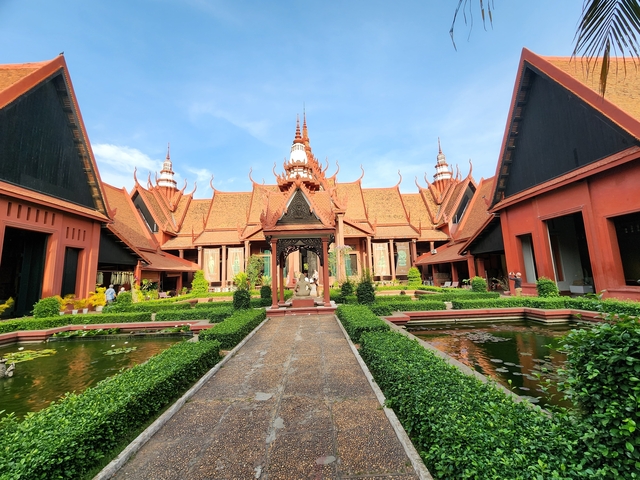 Traditional Vietnamese architecture with well-maintained gardens.