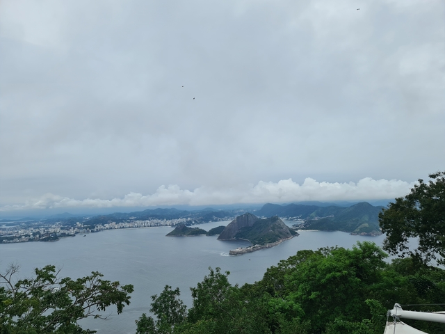 Aerial view of a bay and cityscape with iconic mountain