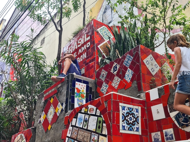 Colorful tiled stairway with people