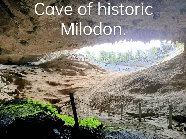 Large cave with daylight filtering in.