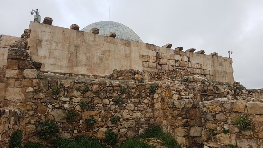       Ancient structure with a dome on top.
  