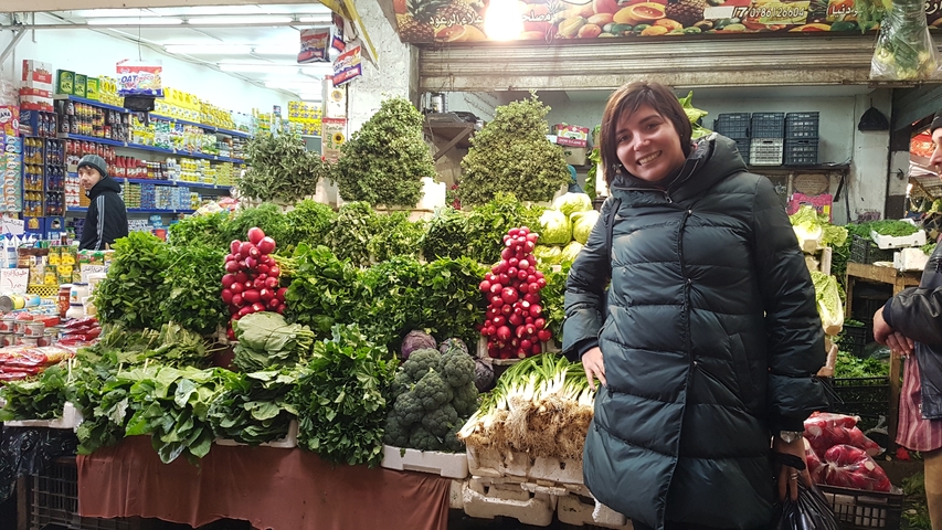       Market stall with a variety of fresh vegetables.
  
