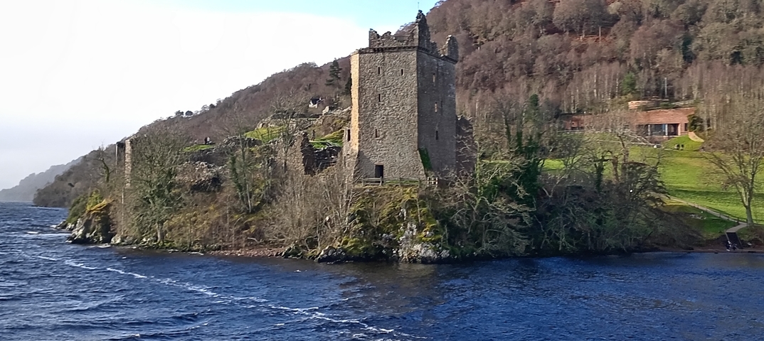       Medieval castle ruins on the edge of Loch Ness.
  