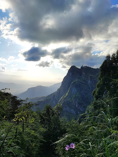 Scenic mountain landscape with clouds.