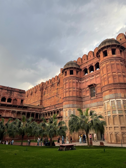 An impressive red fort with towers and intricate details.