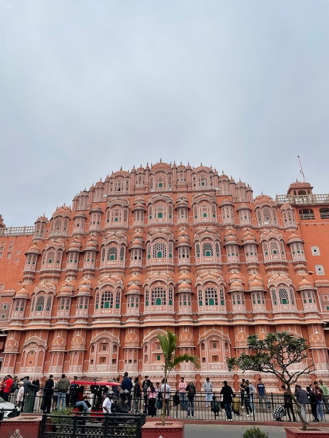 Hawa Mahal with its distinctive pink facade and numerous windows.