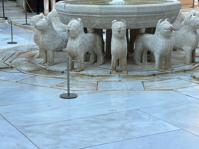 Close-up of a fountain with lion sculptures.