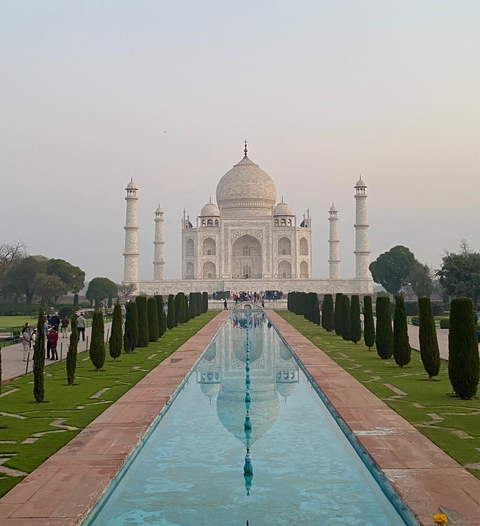       The Taj Mahal with reflection in the long pool.
  