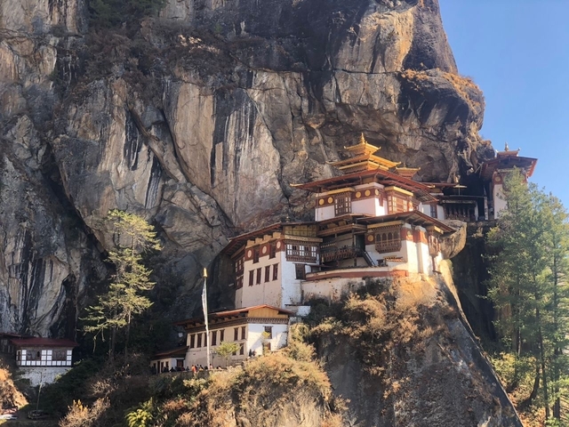       Iconic monastery built into the side of a cliff.
  