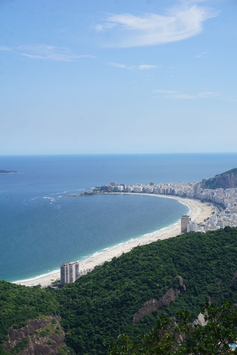 Coastal city with sandy beaches and turquoise waters.