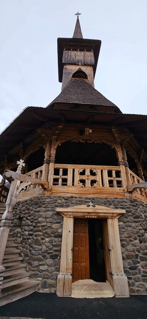 Wooden structure with intricate carvings.