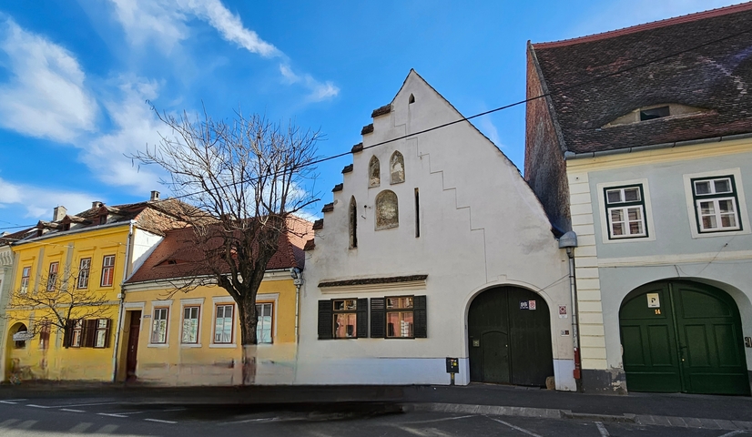 Street view of colorful historical buildings.