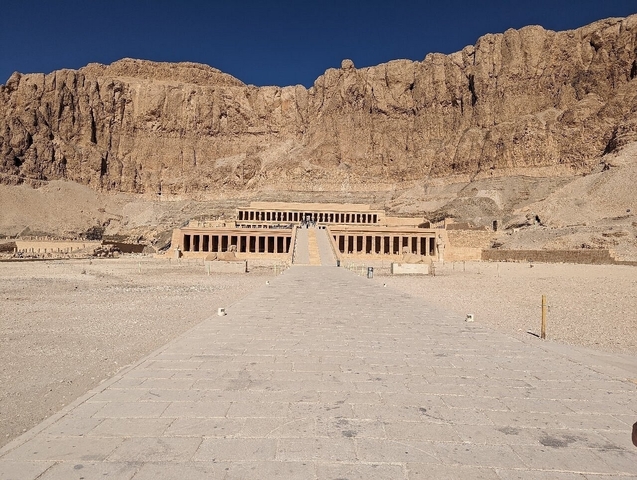 Temple of Hatshepsut against a rocky desert backdrop.