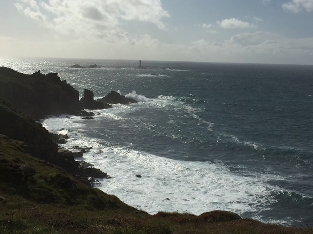 Rocky coastline with crashing waves.