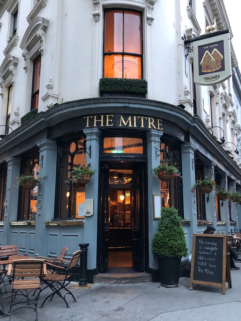 Entrance of a pub named The Mitre.