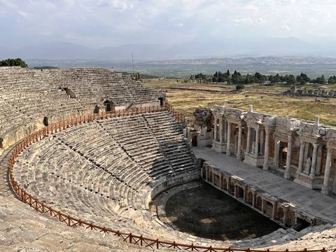       The well-preserved ruins of an ancient amphitheater.
  
