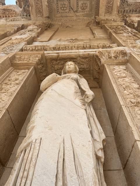       An ancient relief sculpture in a historic site.
  