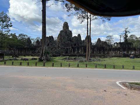       Ancient stone structures in a grassy area
  