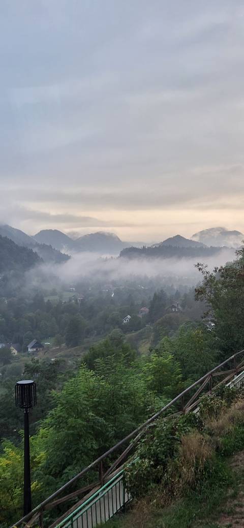       Mountain landscape with morning mist.
  