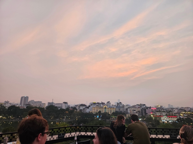       Skyline silhouette at sunset with fading light.
  