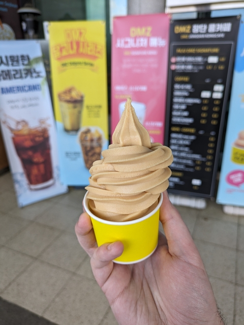 Close-up of swirled ice cream in a cup.